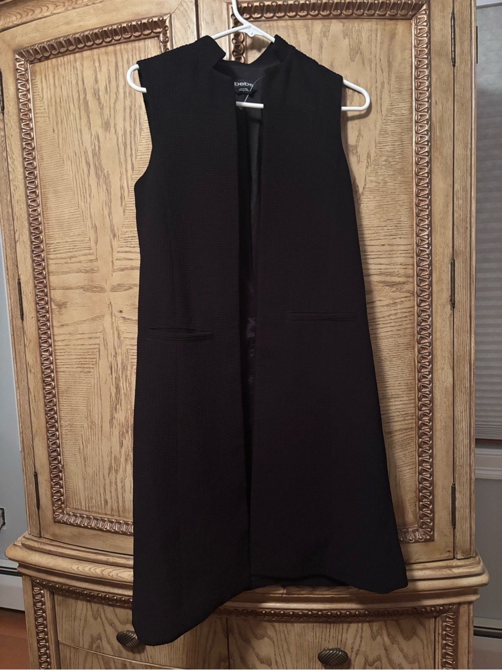 bebe Black Sleeveless vest jacket